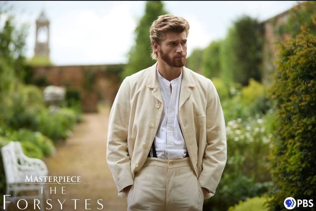 Danny Griffin, a fair haired young man in a white and beige casual outfit