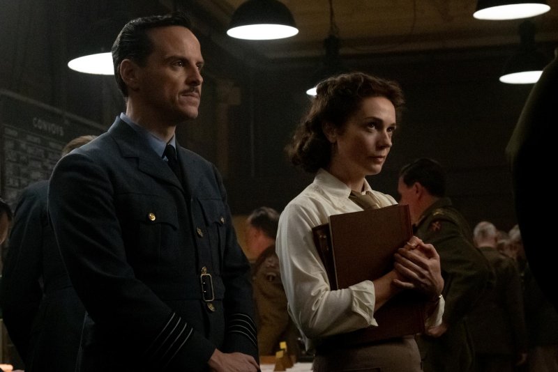 Man and woman in army uniforms.