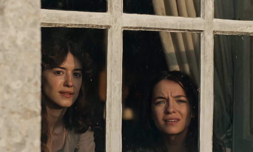 Photo of Elinor and Marianne looking out a window