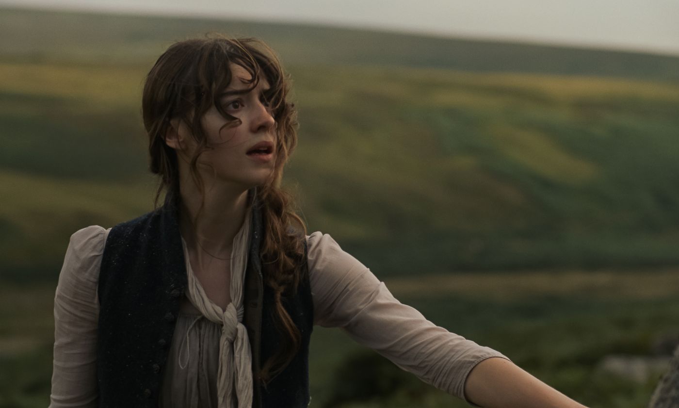 Daisy Edgar-Jones as Elinor Dashwood outdoors with windswept hair in Sense and Sensibility.