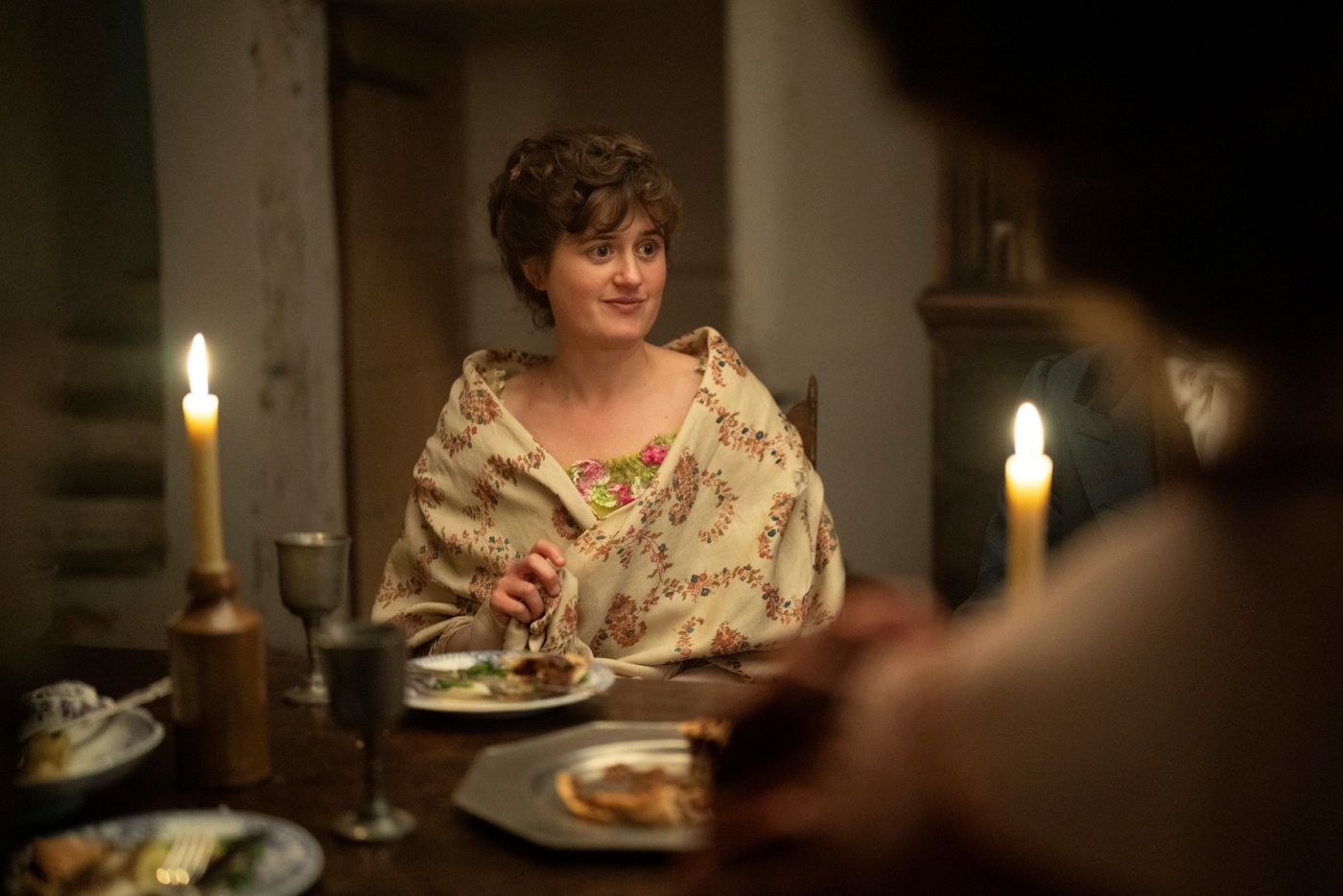 Mary sits at the dinner table during the Lake District trip in The Other Bennet Sister Episode 9.