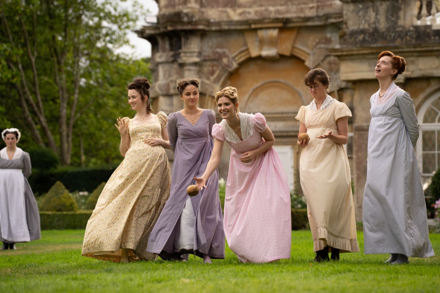 Mary Bennet plays Graces with her sisters in the garden at Pemberley in Episode 8.